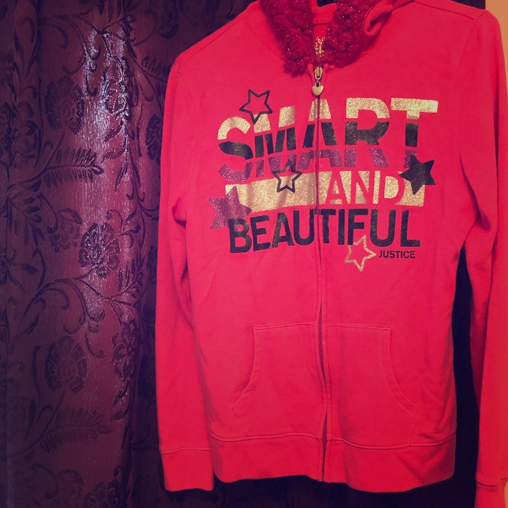 Justice Girl’s hot pink hooded sweater.